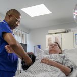 A nurse takes a patient's blood pressure