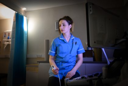 A nurse preparing for an ultrasound scan