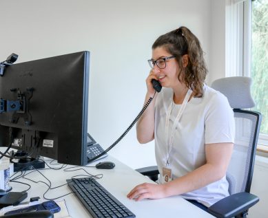 Staff speaking with a patient on the phone