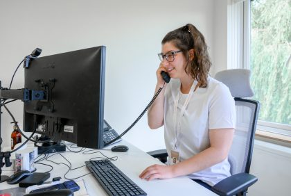 Staff speaking with a patient on the phone