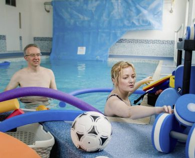 Preparing for workout in hydrotherapy pool