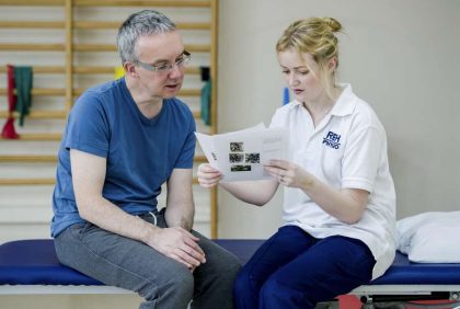 Staff member and patient in discussion