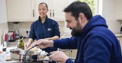 Occupational therapist and patient in kitchen