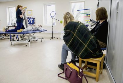 Visitors watching physiotherapy