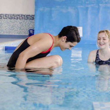 Entering hydrotherapy pool via slider