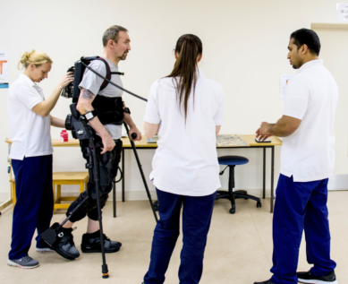 Patient walking using full height exoskeleton