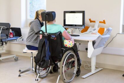 Wheelchair user taking part in Tyromotion therapy