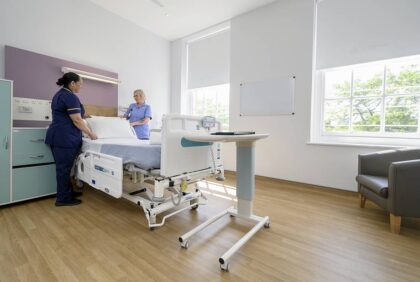 Nurses preparing private room