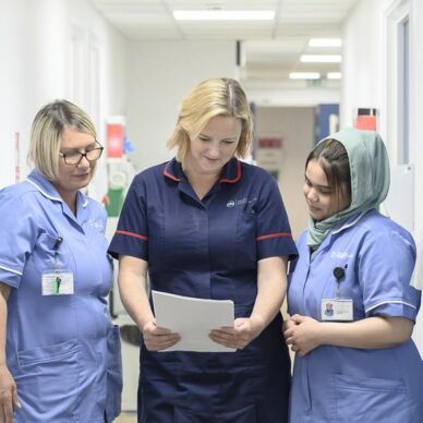 Nurse and carers in discussion