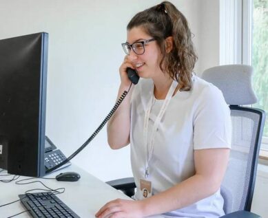 Staff on phone with patient