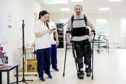 Patient using exoskeleton