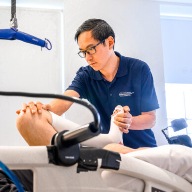 physiotherapist stretching knee