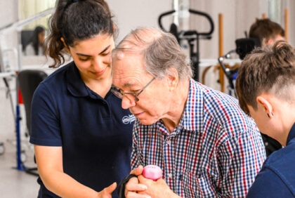 physiotherapists supporting stroke patient